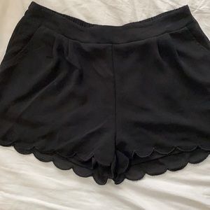 Scalloped black shorts